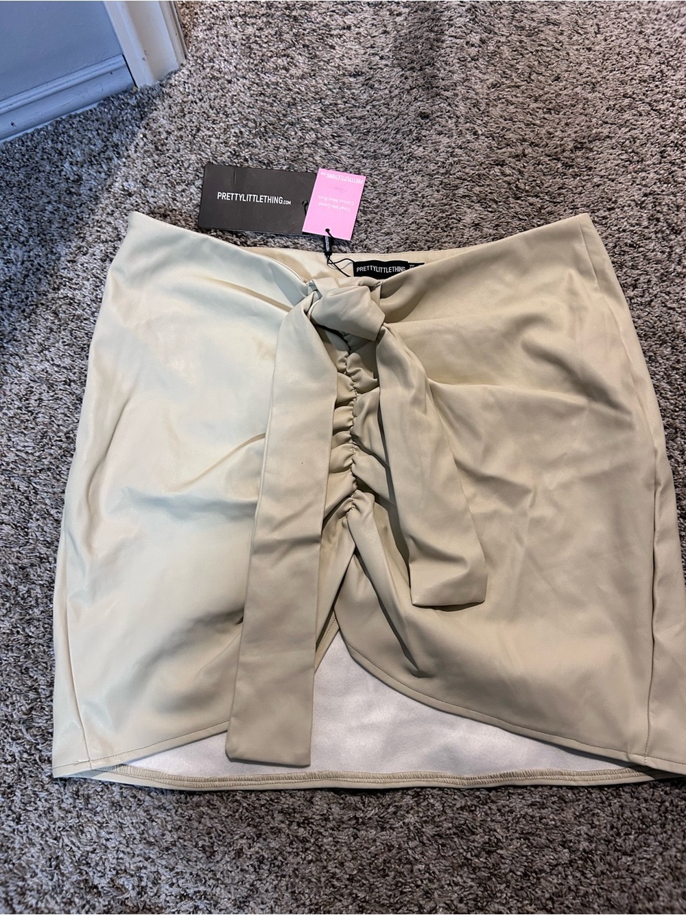 PrettyLittleThing Cream Tie-Front Mini Skirt